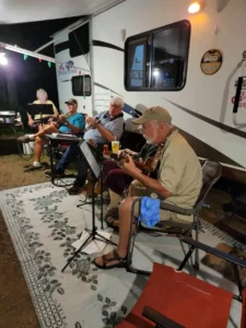 Brend and Dale Moe, Pete McCarty, and Dan Norberg at the Laimon's during the 2021 Carnival