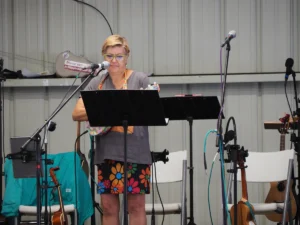 Tawni VanVleet performing in a mini-concert at the 2023 Carnival